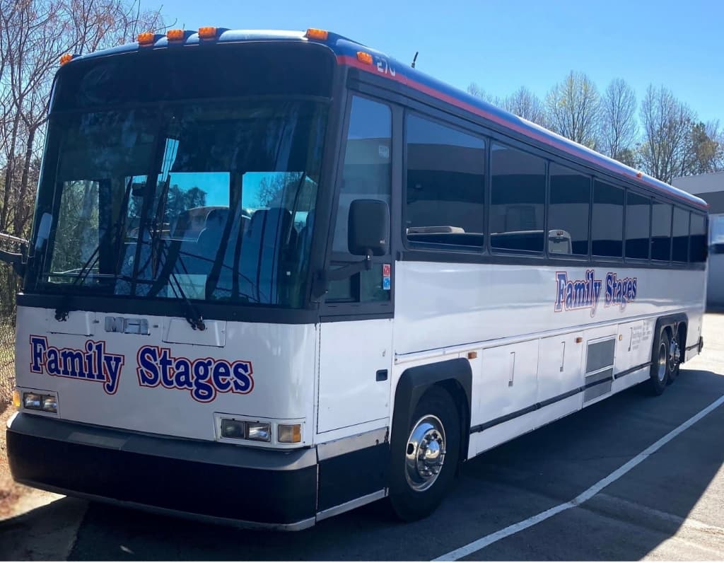 The pristine Family Stages luxury coach exterior in Atlanta GA